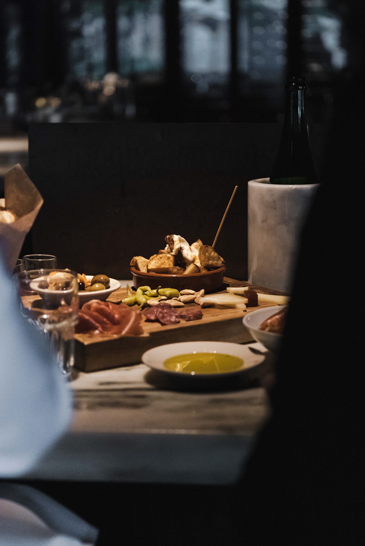 Barcelona Wine Bar Aperitivo: Aperitivo board at Barcelona Wine Bar, showcasing a delightful spread for happy hour in DC.