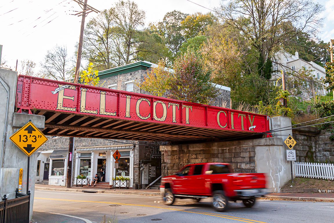 ELLICOTT CITY MD - Historic downtown Main Street- City sign on railroad bridge