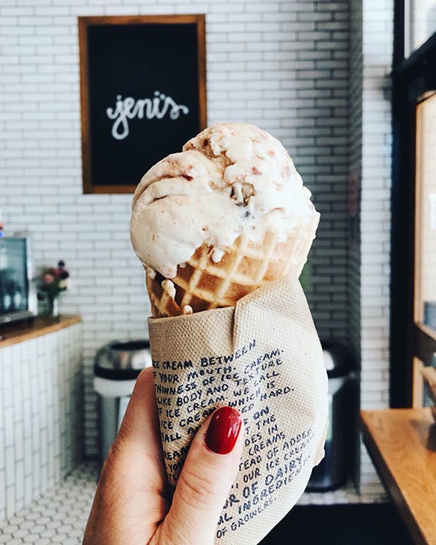 Close-up of a waffle cone filled with Jeni's Ice Cream, a location that provides gluten-free ice cream options, making it a potential stop for individuals exploring gluten free bakeries DC and other gluten-free treats.