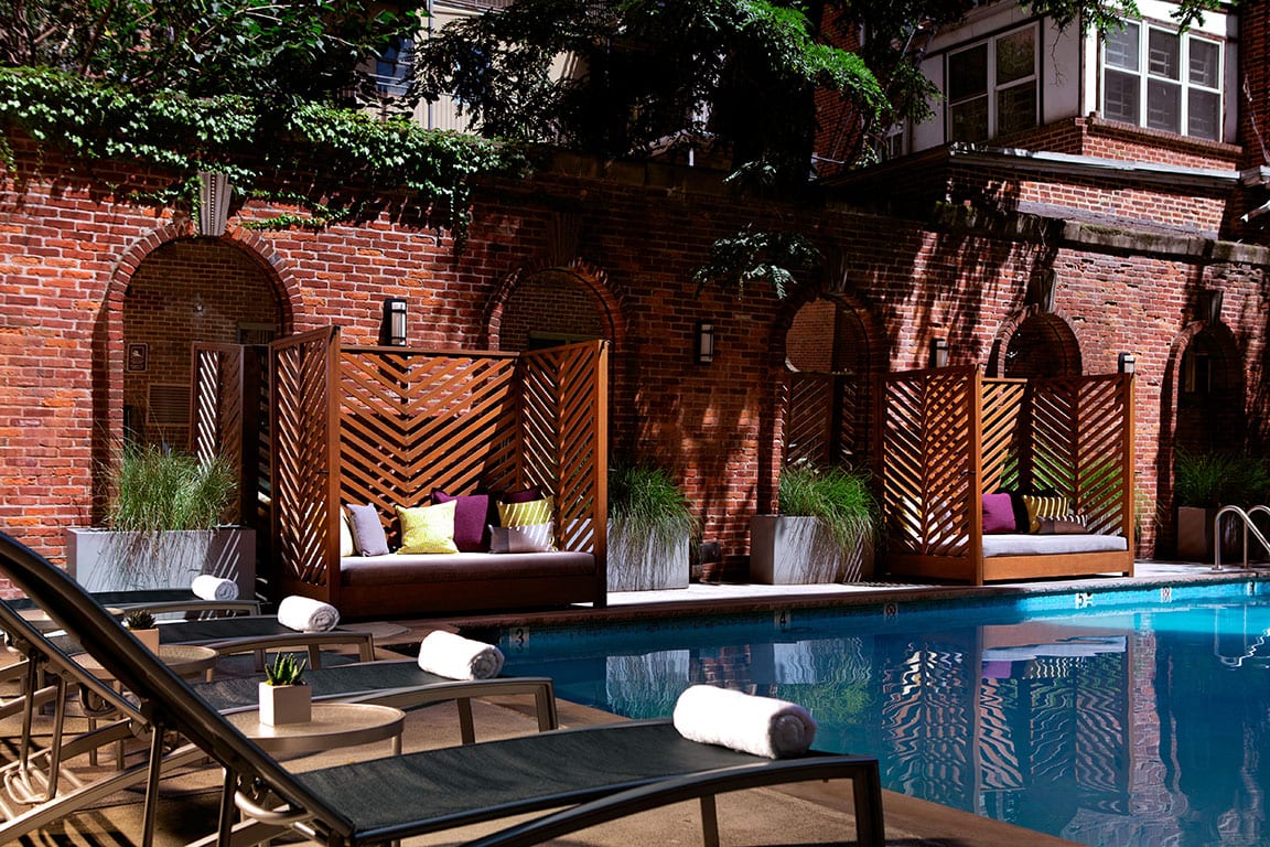 A stunning view of the pool lounge at Royal Sonesta, a Washington DC hotel with rooftop pool