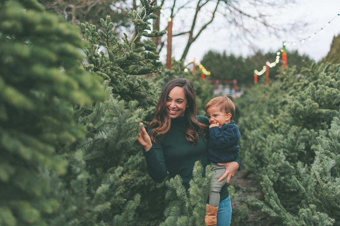 25+ Beautiful Cut Your Own Christmas Tree Farms In Virginia - Mom and baby looking at Christmas Trees